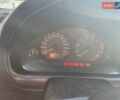 Серый Мицубиси Харизма, объемом двигателя 1.6 л и пробегом 317 тыс. км за 3000 $, фото 2 на Automoto.ua