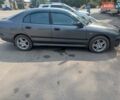 Серый Мицубиси Харизма, объемом двигателя 1.8 л и пробегом 282 тыс. км за 3600 $, фото 2 на Automoto.ua