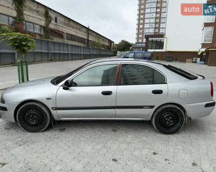 Сірий Міцубісі Харизма, об'ємом двигуна 1.6 л та пробігом 398 тис. км за 2500 $, фото 3 на Automoto.ua