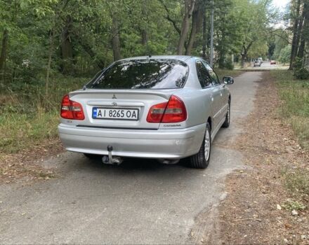 Серый Мицубиси Харизма, объемом двигателя 1.8 л и пробегом 265 тыс. км за 3500 $, фото 3 на Automoto.ua