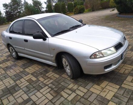 Серый Мицубиси Харизма, объемом двигателя 1.6 л и пробегом 330 тыс. км за 2800 $, фото 5 на Automoto.ua