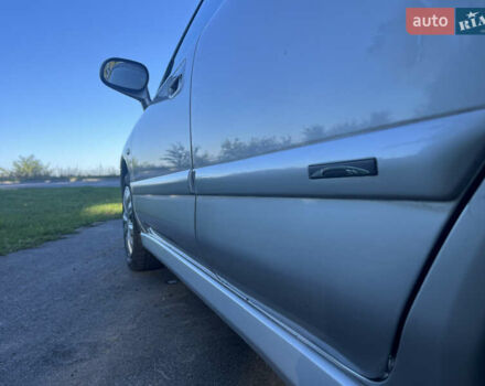 Серый Мицубиси Харизма, объемом двигателя 1.8 л и пробегом 214 тыс. км за 5650 $, фото 5 на Automoto.ua