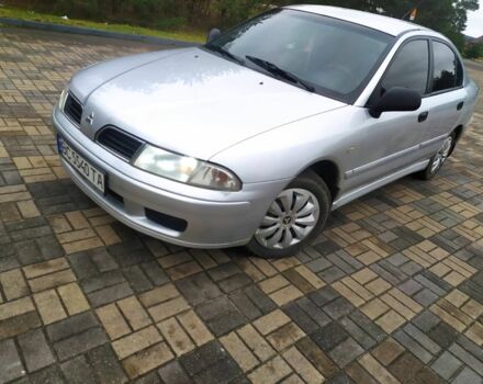 Серый Мицубиси Харизма, объемом двигателя 1.6 л и пробегом 330 тыс. км за 2800 $, фото 11 на Automoto.ua