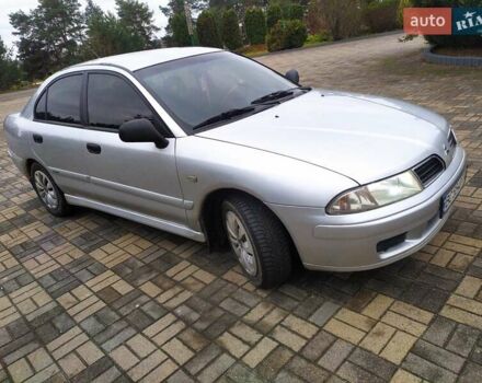 Сірий Міцубісі Харизма, об'ємом двигуна 1.6 л та пробігом 330 тис. км за 2800 $, фото 16 на Automoto.ua