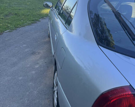 Серый Мицубиси Харизма, объемом двигателя 1.8 л и пробегом 214 тыс. км за 5650 $, фото 4 на Automoto.ua