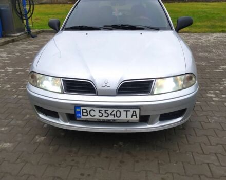 Серый Мицубиси Харизма, объемом двигателя 1.6 л и пробегом 330 тыс. км за 2800 $, фото 2 на Automoto.ua