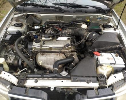 Серый Мицубиси Харизма, объемом двигателя 1.6 л и пробегом 330 тыс. км за 2800 $, фото 21 на Automoto.ua