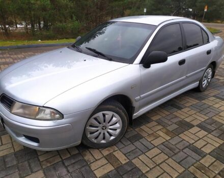 Серый Мицубиси Харизма, объемом двигателя 1.6 л и пробегом 330 тыс. км за 2800 $, фото 4 на Automoto.ua