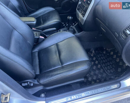 Серый Мицубиси Харизма, объемом двигателя 1.8 л и пробегом 214 тыс. км за 5650 $, фото 26 на Automoto.ua