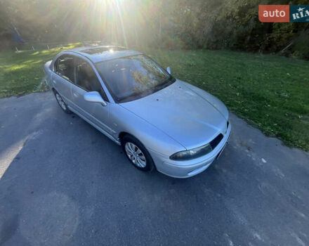 Серый Мицубиси Харизма, объемом двигателя 1.8 л и пробегом 214 тыс. км за 5650 $, фото 3 на Automoto.ua