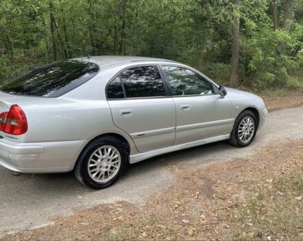 Серый Мицубиси Харизма, объемом двигателя 1.8 л и пробегом 265 тыс. км за 3500 $, фото 2 на Automoto.ua