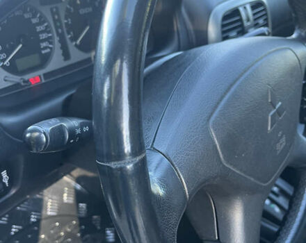 Серый Мицубиси Харизма, объемом двигателя 1.8 л и пробегом 214 тыс. км за 5650 $, фото 12 на Automoto.ua