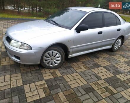 Сірий Міцубісі Харизма, об'ємом двигуна 1.6 л та пробігом 330 тис. км за 2800 $, фото 18 на Automoto.ua