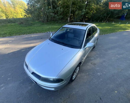 Серый Мицубиси Харизма, объемом двигателя 1.8 л и пробегом 214 тыс. км за 5650 $, фото 2 на Automoto.ua