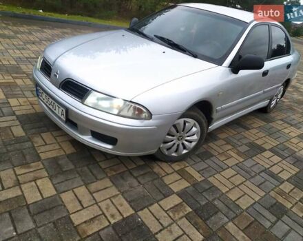 Сірий Міцубісі Харизма, об'ємом двигуна 1.6 л та пробігом 330 тис. км за 2800 $, фото 10 на Automoto.ua