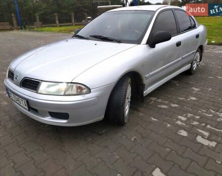 Сірий Міцубісі Харизма, об'ємом двигуна 1.6 л та пробігом 330 тис. км за 2800 $, фото 5 на Automoto.ua