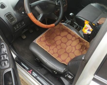 Серый Мицубиси Харизма, объемом двигателя 1.6 л и пробегом 330 тыс. км за 2800 $, фото 14 на Automoto.ua