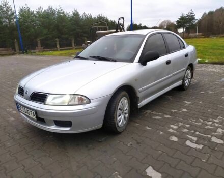 Серый Мицубиси Харизма, объемом двигателя 1.6 л и пробегом 330 тыс. км за 2800 $, фото 3 на Automoto.ua