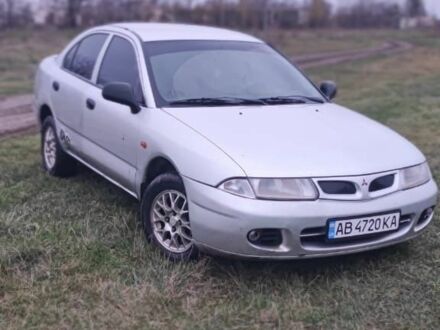 Серый Мицубиси Харизма, объемом двигателя 1.6 л и пробегом 1 тыс. км за 1400 $, фото 1 на Automoto.ua