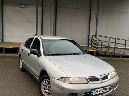 Сірий Міцубісі Харизма, об'ємом двигуна 1.6 л та пробігом 250 тис. км за 1800 $, фото 1 на Automoto.ua