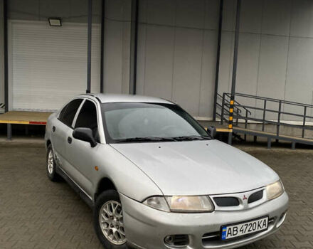 Серый Мицубиси Харизма, объемом двигателя 1.6 л и пробегом 250 тыс. км за 1800 $, фото 1 на Automoto.ua