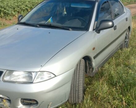 Сірий Міцубісі Харизма, об'ємом двигуна 0 л та пробігом 354 тис. км за 3100 $, фото 1 на Automoto.ua