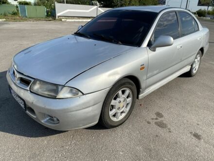 Мицубиси Харизма 1997 в Петропавловке на Automoto.ua Серый Мицубиси Харизма, объемом двигателя 1.8 л и пробегом 251 тыс. км за 2000 $, фото 1 на Automoto.ua