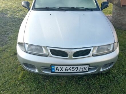 Серый Мицубиси Харизма, объемом двигателя 0 л и пробегом 330 тыс. км за 2400 $, фото 1 на Automoto.ua