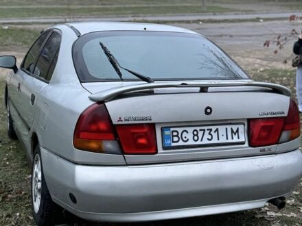 Серый Мицубиси Харизма, объемом двигателя 1.6 л и пробегом 340 тыс. км за 2000 $, фото 1 на Automoto.ua