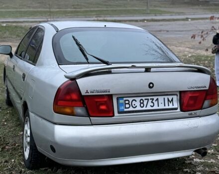 Серый Мицубиси Харизма, объемом двигателя 1.6 л и пробегом 340 тыс. км за 2000 $, фото 1 на Automoto.ua