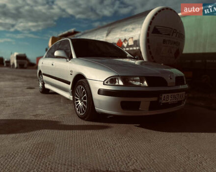 Серый Мицубиси Харизма, объемом двигателя 1.83 л и пробегом 258 тыс. км за 4200 $, фото 1 на Automoto.ua