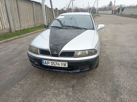 Сірий Міцубісі Харизма, об'ємом двигуна 1.8 л та пробігом 371 тис. км за 2200 $, фото 1 на Automoto.ua