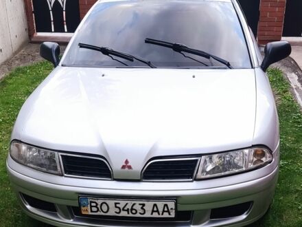 Сірий Міцубісі Харизма, об'ємом двигуна 1.9 л та пробігом 183 тис. км за 2500 $, фото 1 на Automoto.ua