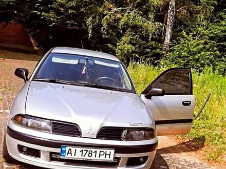 Міцубісі Харизма 2001 у Києві на Automoto.ua Сірий Міцубісі Харизма, об'ємом двигуна 1.8 л та пробігом 380 тис. км за 3150 $, фото 1 на Automoto.ua
