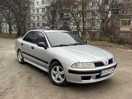 Сірий Міцубісі Харизма, об'ємом двигуна 1.83 л та пробігом 265 тис. км за 2850 $, фото 1 на Automoto.ua