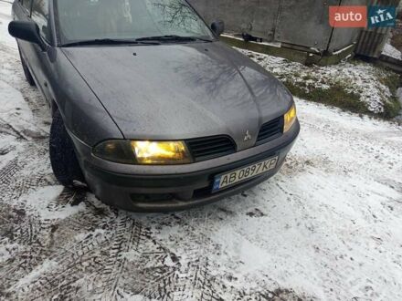 Сірий Міцубісі Харизма, об'ємом двигуна 1.6 л та пробігом 230 тис. км за 3000 $, фото 1 на Automoto.ua