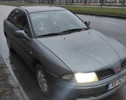 Сірий Міцубісі Харизма, об'ємом двигуна 1.8 л та пробігом 379 тис. км за 1307 $, фото 1 на Automoto.ua