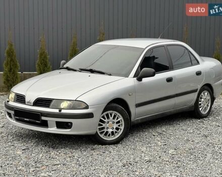 Сірий Міцубісі Харизма, об'ємом двигуна 1.83 л та пробігом 326 тис. км за 3400 $, фото 1 на Automoto.ua