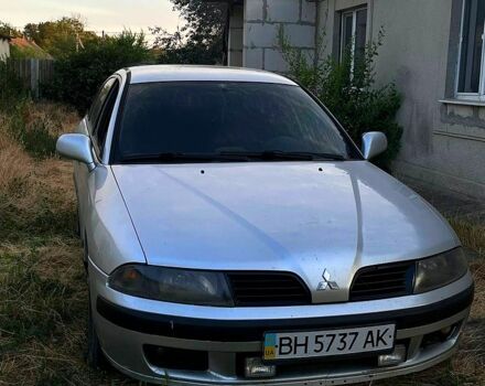 Серый Мицубиси Харизма, объемом двигателя 1.9 л и пробегом 200 тыс. км за 1500 $, фото 1 на Automoto.ua
