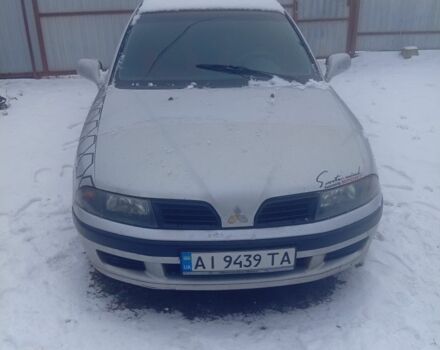 Серый Мицубиси Харизма, объемом двигателя 1.6 л и пробегом 217 тыс. км за 2700 $, фото 1 на Automoto.ua