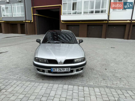 Серый Мицубиси Харизма, объемом двигателя 1.6 л и пробегом 398 тыс. км за 2500 $, фото 1 на Automoto.ua