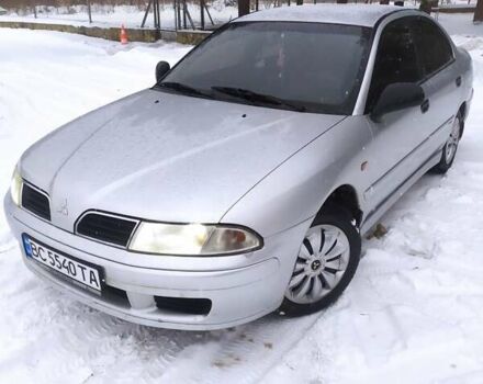 Сірий Міцубісі Харизма, об'ємом двигуна 1.6 л та пробігом 330 тис. км за 1950 $, фото 1 на Automoto.ua