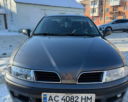 Серый Мицубиси Харизма, объемом двигателя 1.6 л и пробегом 383 тыс. км за 3200 $, фото 1 на Automoto.ua