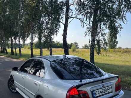 Серый Мицубиси Харизма, объемом двигателя 1.6 л и пробегом 290 тыс. км за 3900 $, фото 1 на Automoto.ua