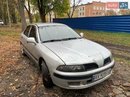 Серый Мицубиси Харизма, объемом двигателя 1.6 л и пробегом 285 тыс. км за 3000 $, фото 1 на Automoto.ua