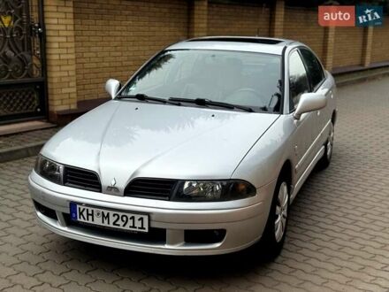 Сірий Міцубісі Харизма, об'ємом двигуна 1.8 л та пробігом 214 тис. км за 4400 $, фото 1 на Automoto.ua