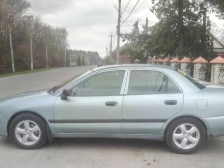 Сірий Міцубісі Харизма, об'ємом двигуна 0 л та пробігом 275 тис. км за 2309 $, фото 1 на Automoto.ua