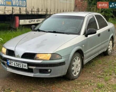 Сірий Міцубісі Харизма, об'ємом двигуна 1.6 л та пробігом 245 тис. км за 1700 $, фото 1 на Automoto.ua