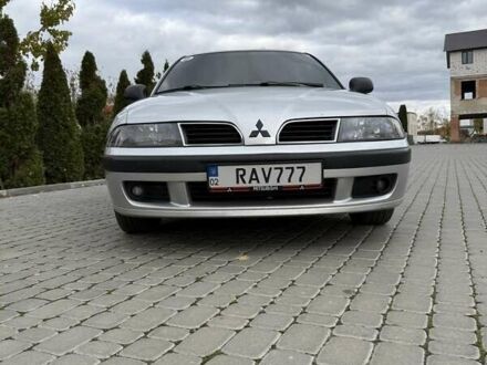 Міцубісі Харизма 2004 у Ильинцах на Automoto.ua Сірий Міцубісі Харизма, об'ємом двигуна 1.83 л та пробігом 319 тис. км за 4500 $, фото 1 на Automoto.ua
