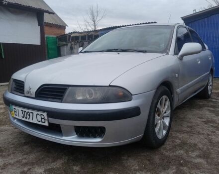 Серый Мицубиси Харизма, объемом двигателя 1.6 л и пробегом 300 тыс. км за 2500 $, фото 1 на Automoto.ua